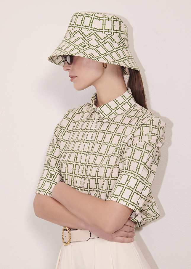 Bob ecru with green graphic desing bucket hat Off-white TARA JARMON