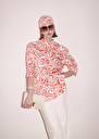 Tallulah ecru with coral graphic design top Coral TARA JARMON